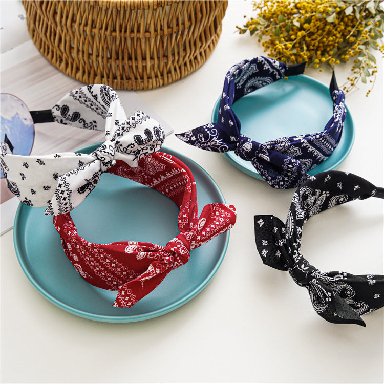 Paisley print headband with bow