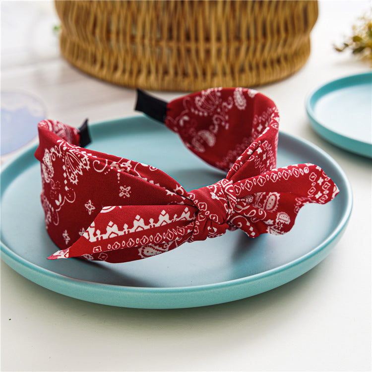 Paisley print headband with bow