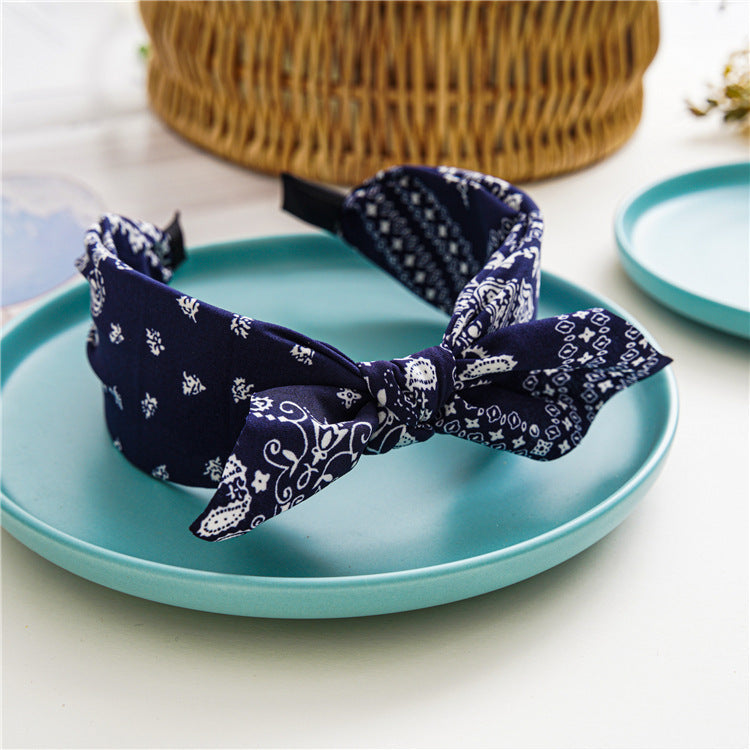 Paisley print headband with bow