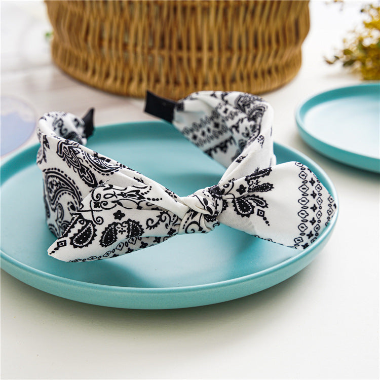 Paisley print headband with bow