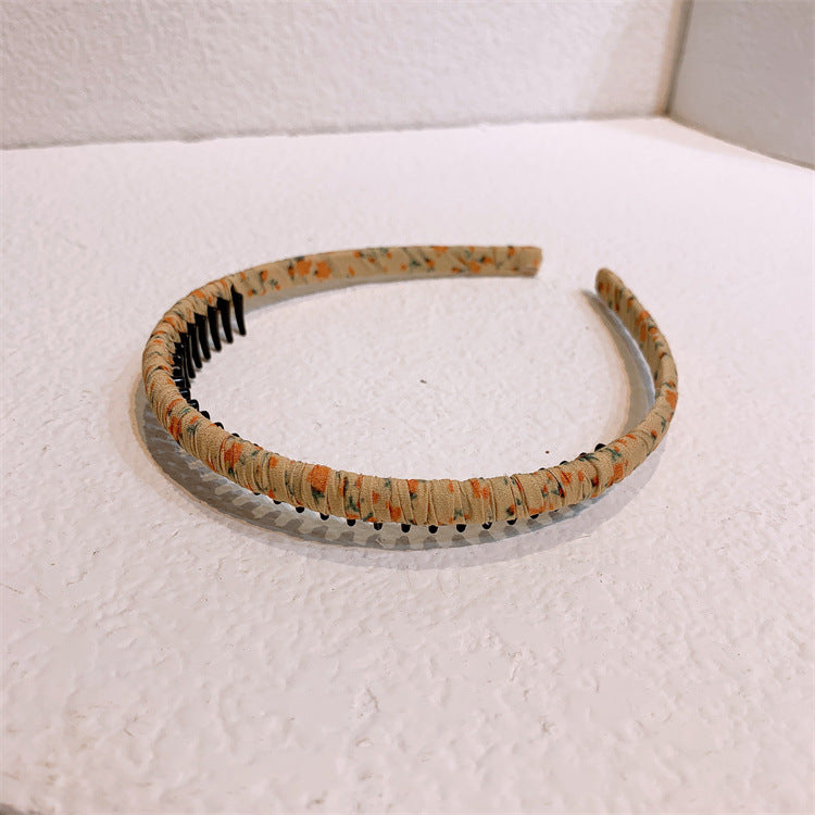 Floral prints ruched headband with teeth
