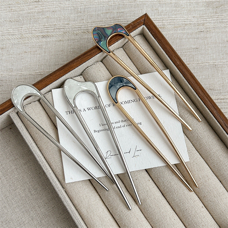 Metallic hair fork