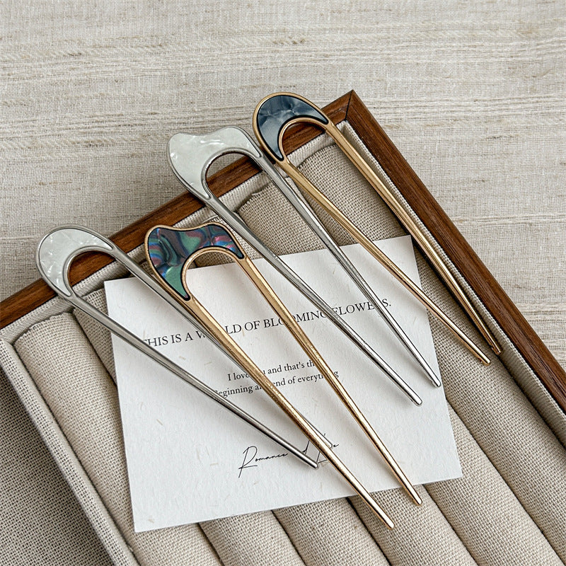 Metallic hair fork