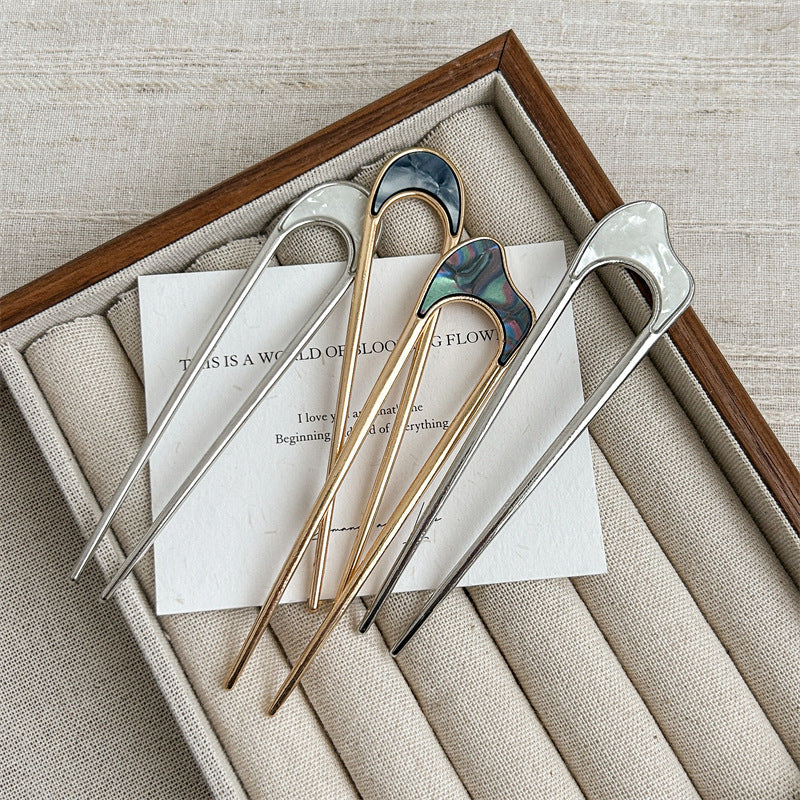 Metallic hair fork