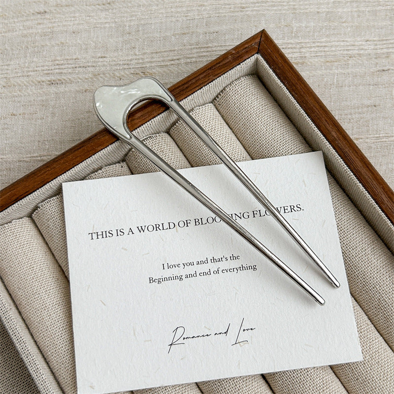 Metallic hair fork