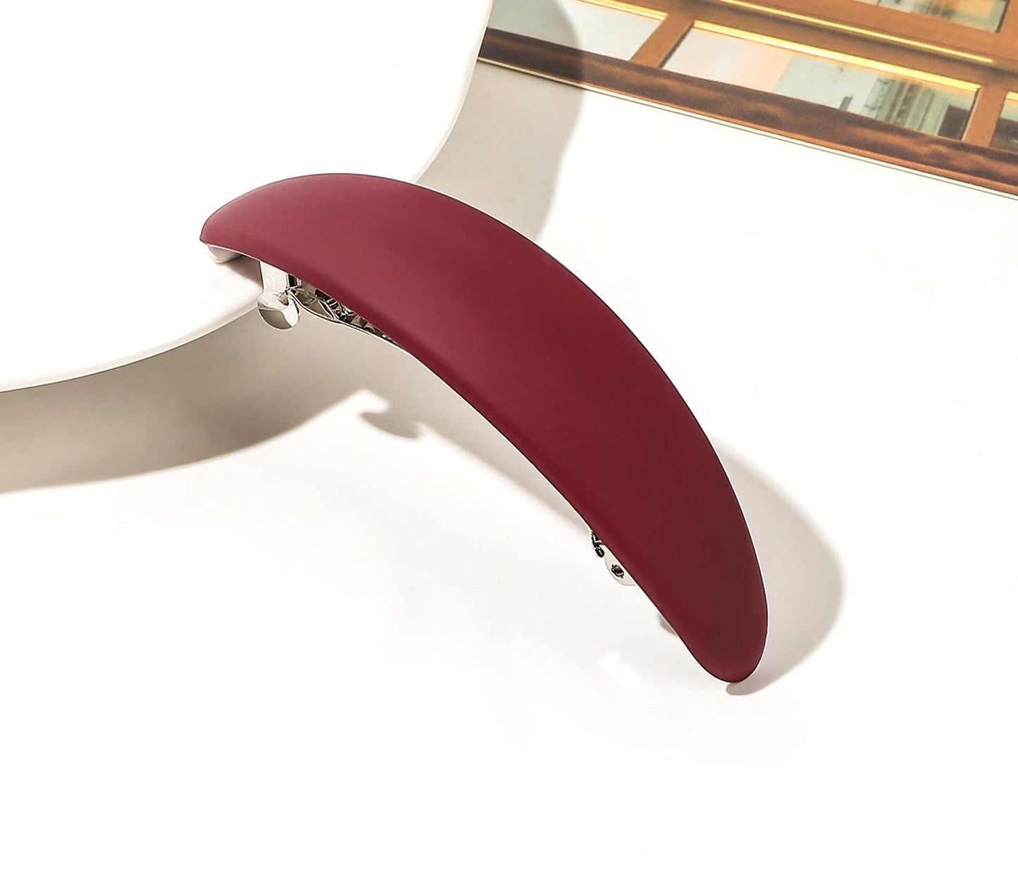 Oval acrylic hair barrette