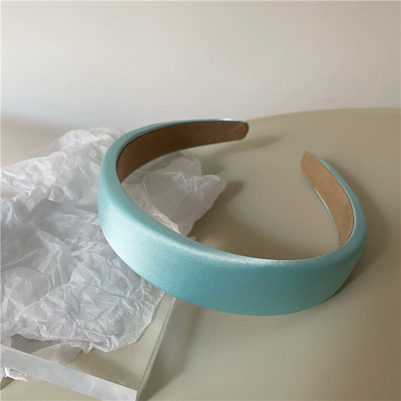 Thinly padded satin headband