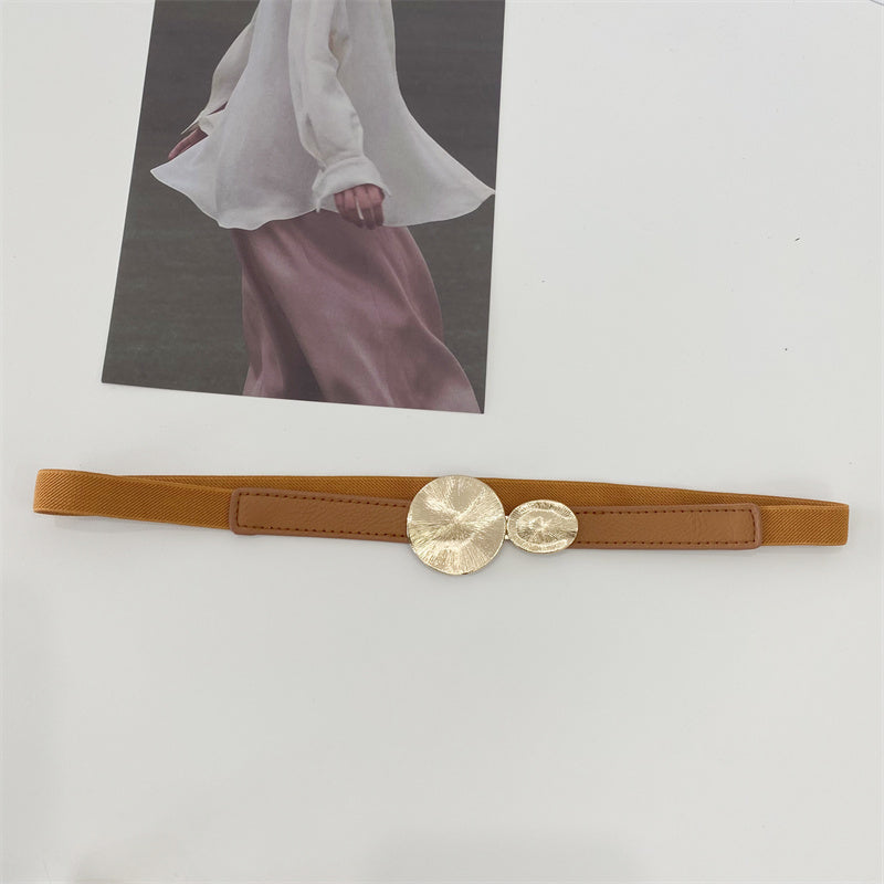 Stretchy thin belt with metallic circles buckles