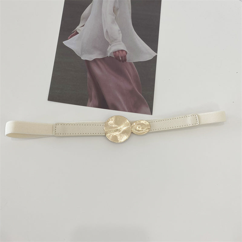 Stretchy thin belt with metallic circles buckles