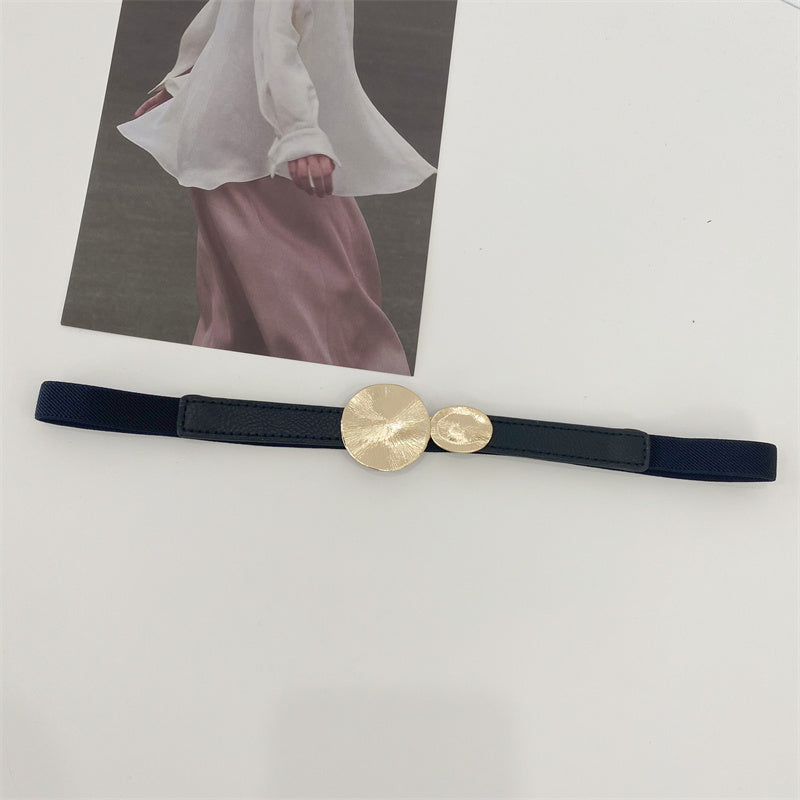 Stretchy thin belt with metallic circles buckles