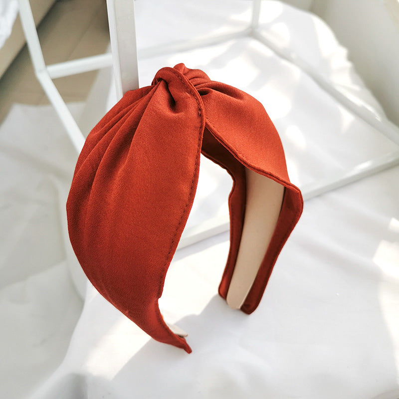 Twist top headband in rust red