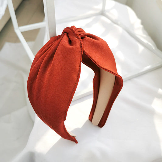 Twist top headband in rust red