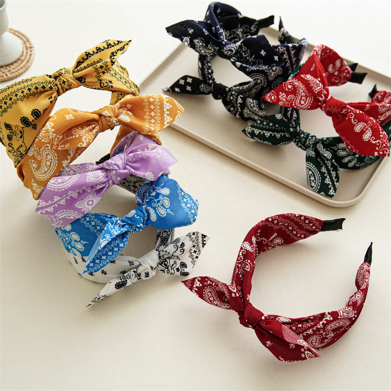 Paisley print headband with bow