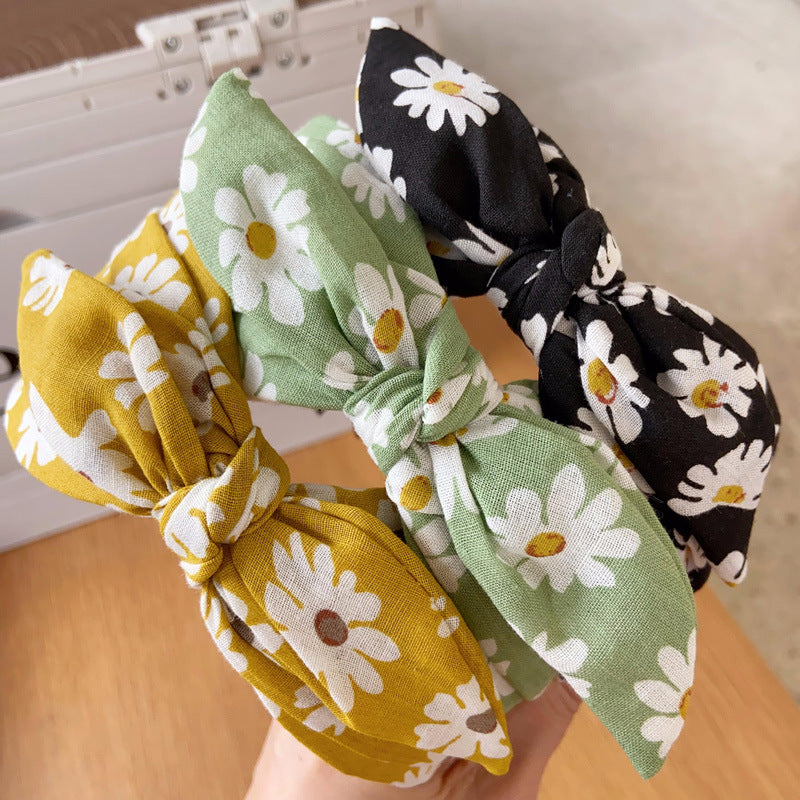 Daisy print headband with bow