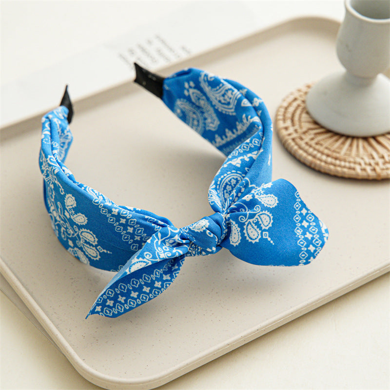 Paisley print headband with bow