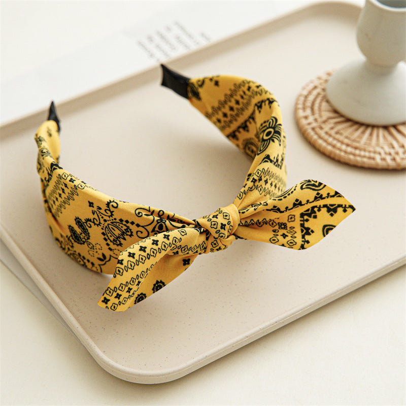 Paisley print headband with bow