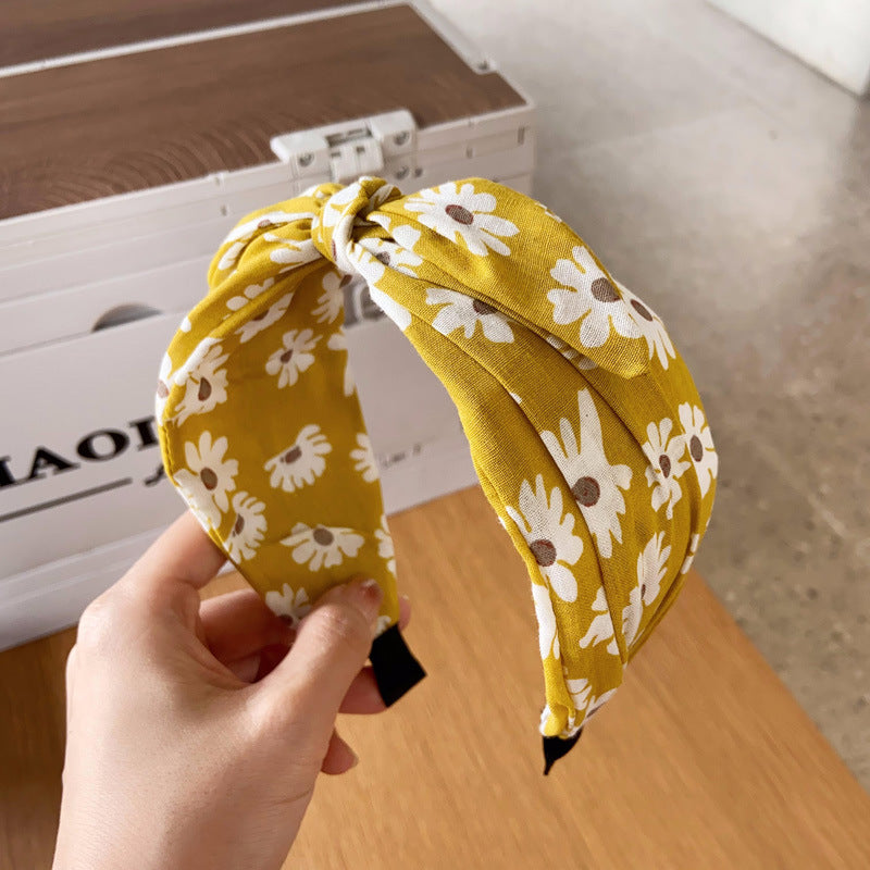 Daisy print headband with bow