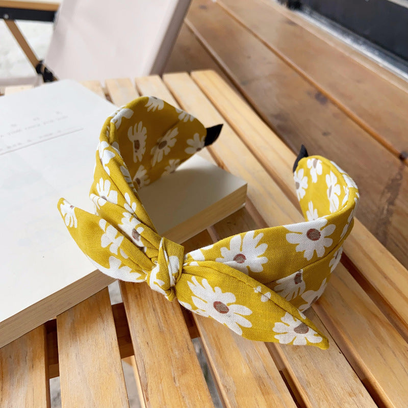 Daisy print headband with bow
