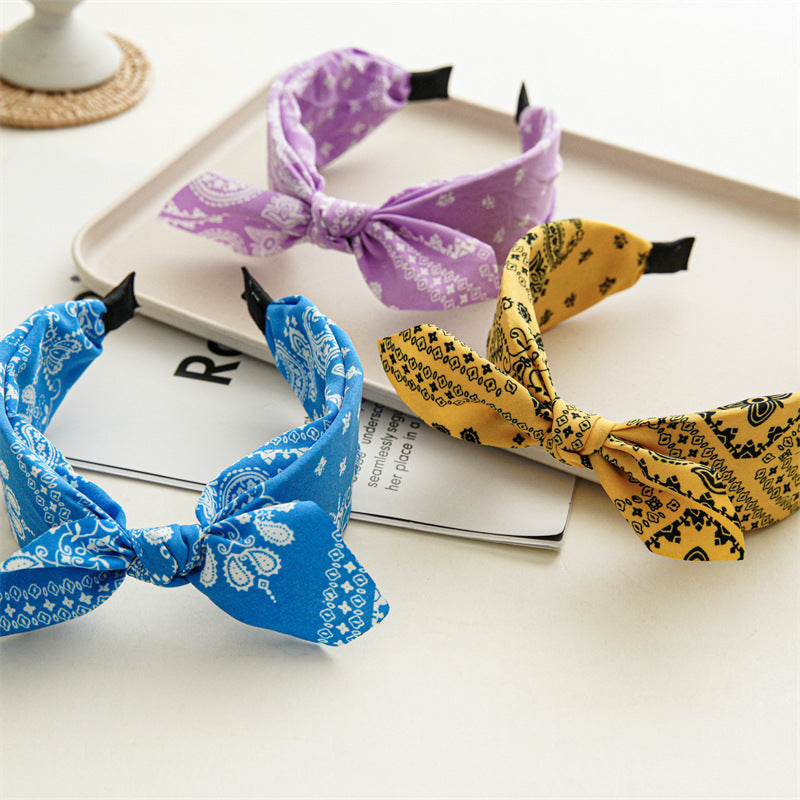 Paisley print headband with bow