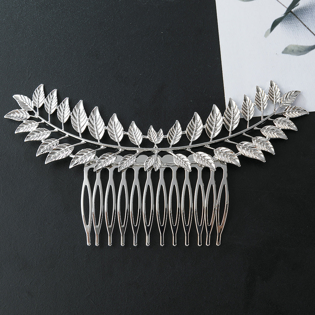 Large metallic leaf branch hair comb