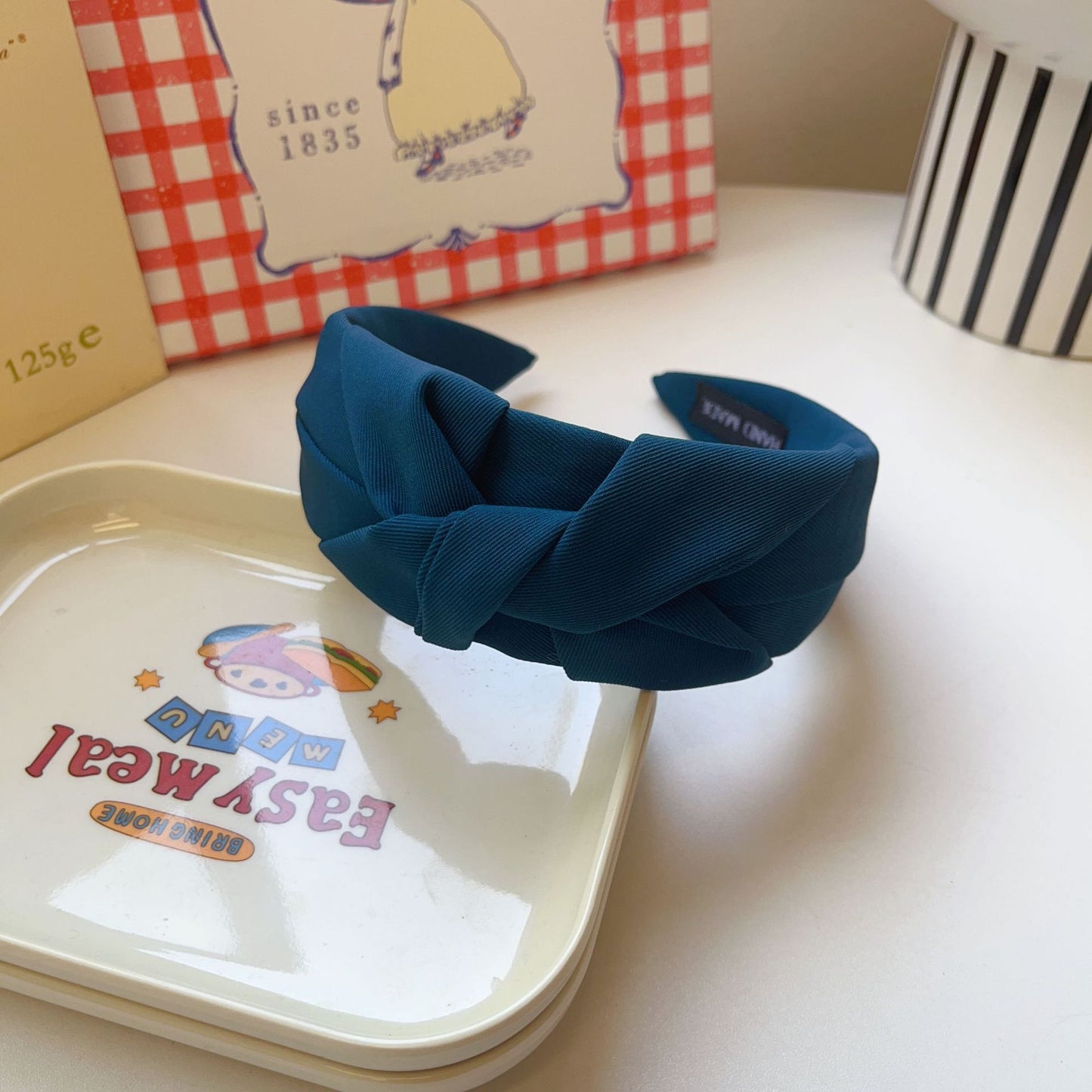 Twist knotted top headband