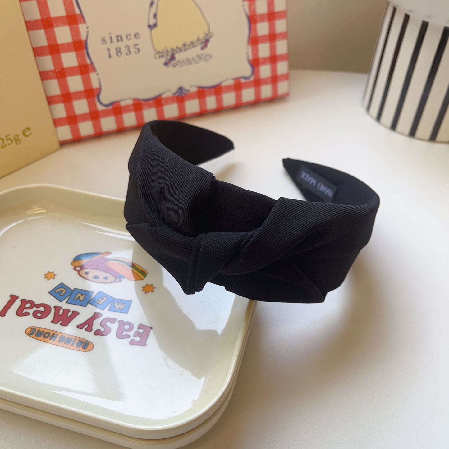 Twist knotted top headband