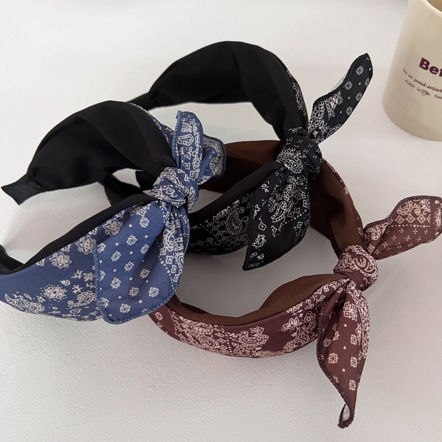 Paisley print black headband with bow