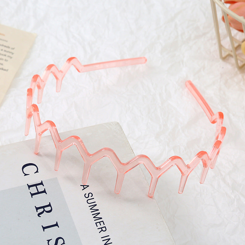 Wavy edge acrylic headband with teeth