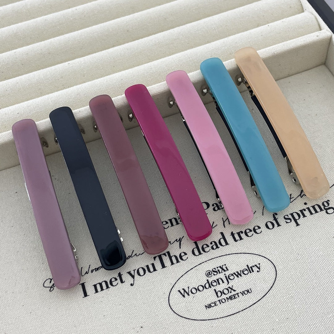 Small resin plain hair barrette