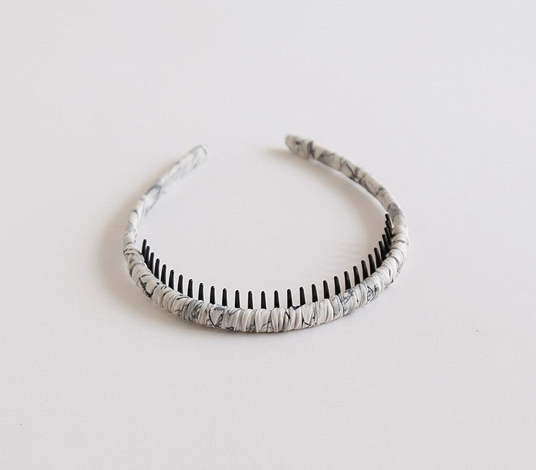 Ruched headband with teeth