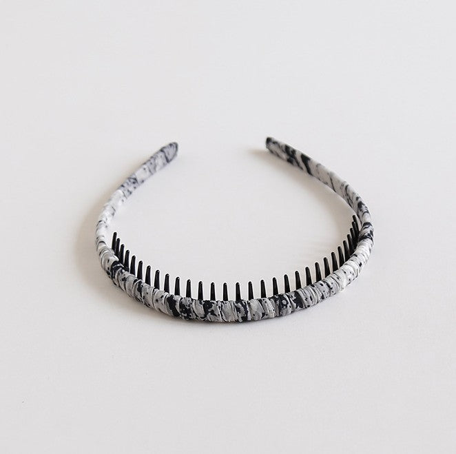 Ruched headband with teeth