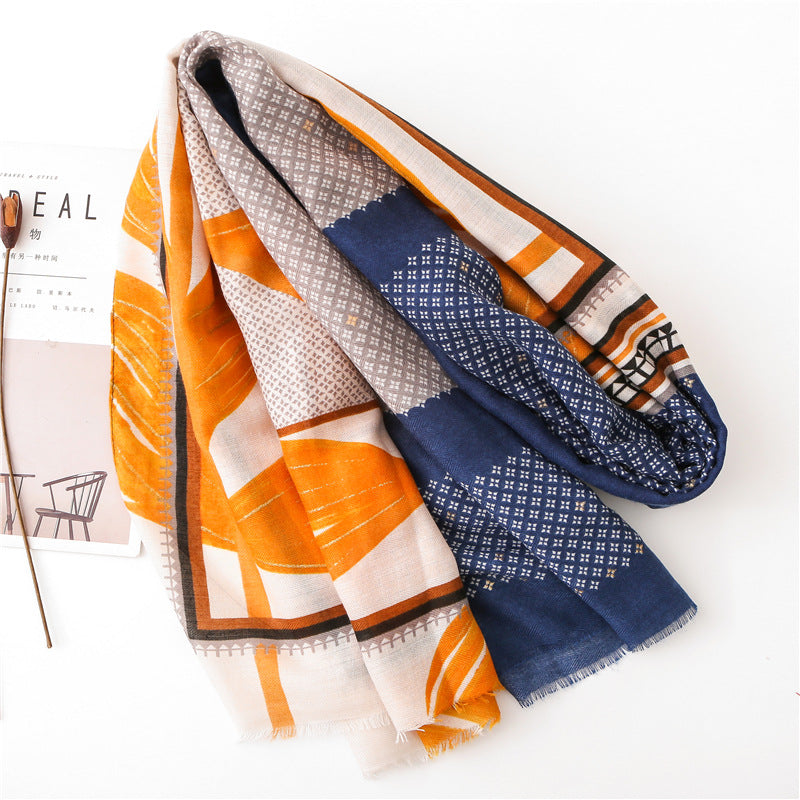 Gold stamped orange yellow leaves print navy grey fringed scarf