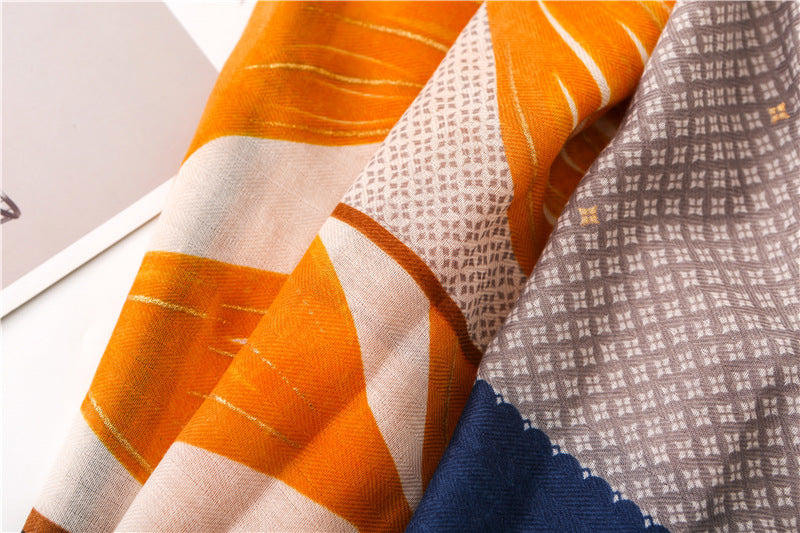 Gold stamped orange yellow leaves print navy grey fringed scarf
