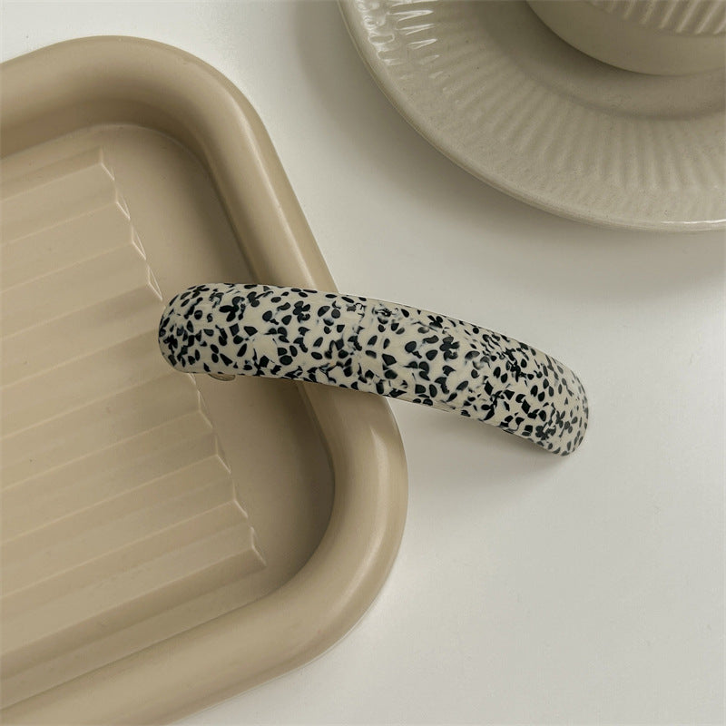 Smooth resin arch rectangle barrette