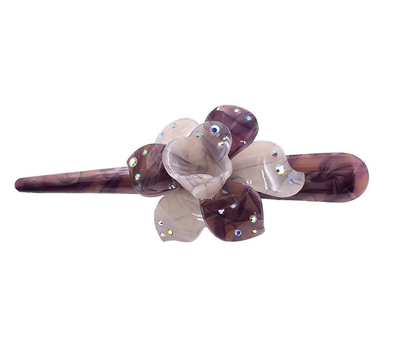 Large resin Ibis clip with flower