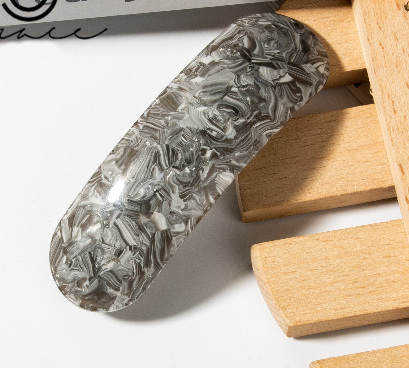 Acrylic arch hair barrette