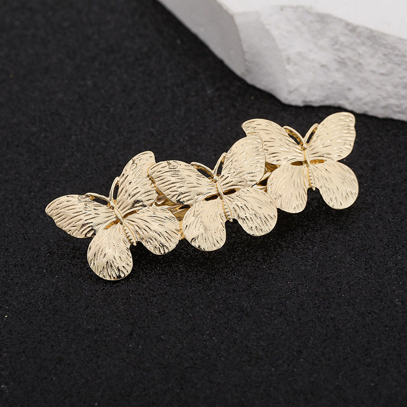 Triple butterflies small hair barrette