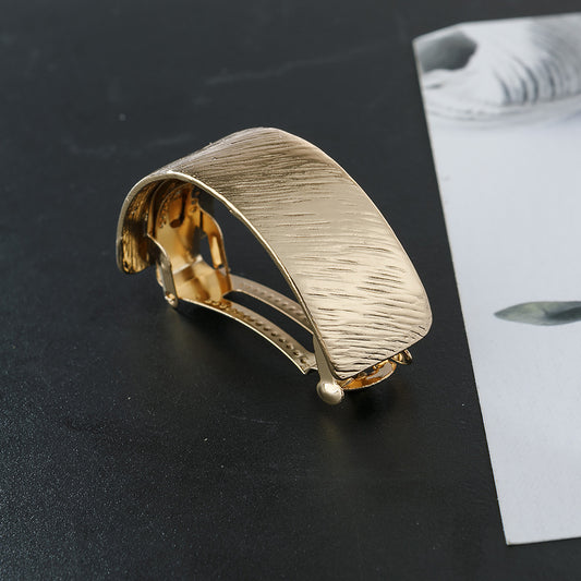 Slim pony tail barrette in brushed metal
