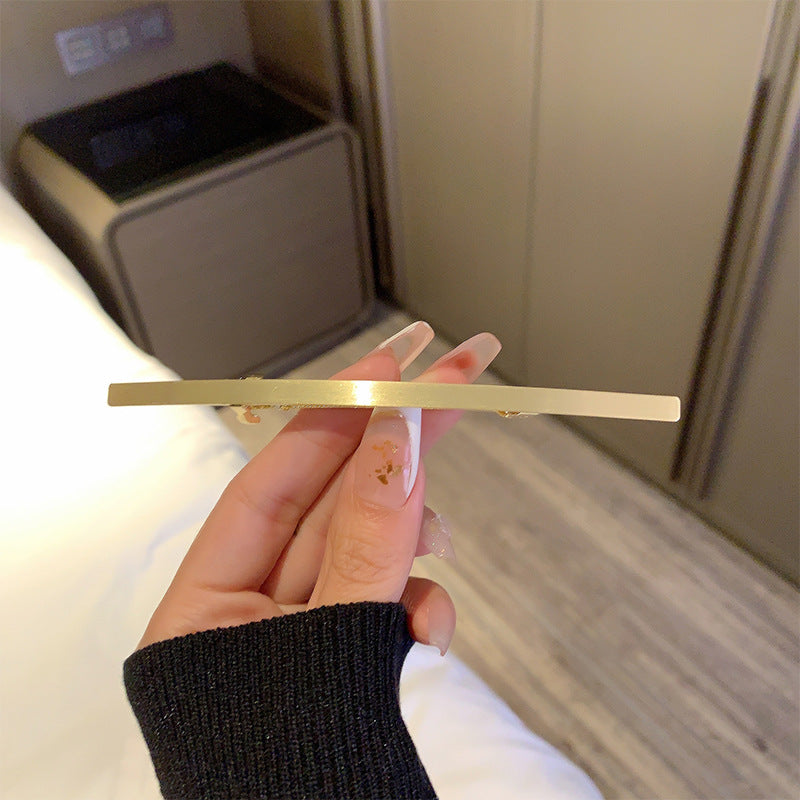 Super slim extra-long metallic barrette