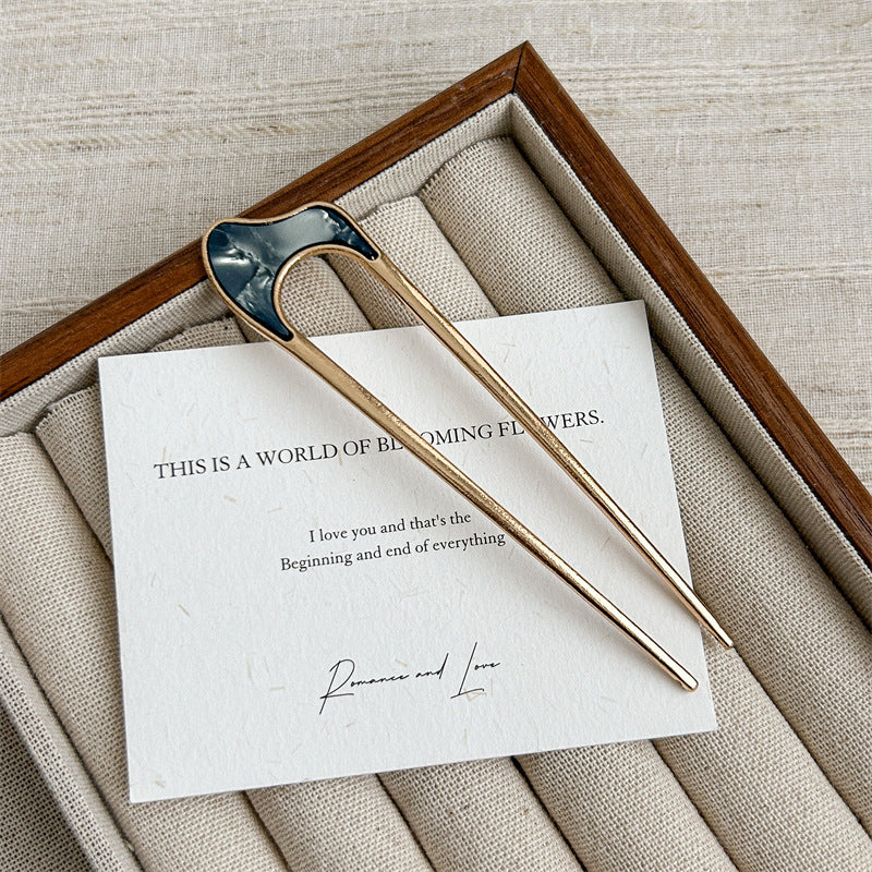 Metallic hair fork