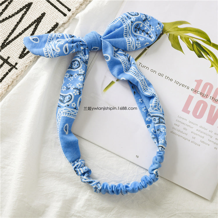 Paisley print elastic headband with bow