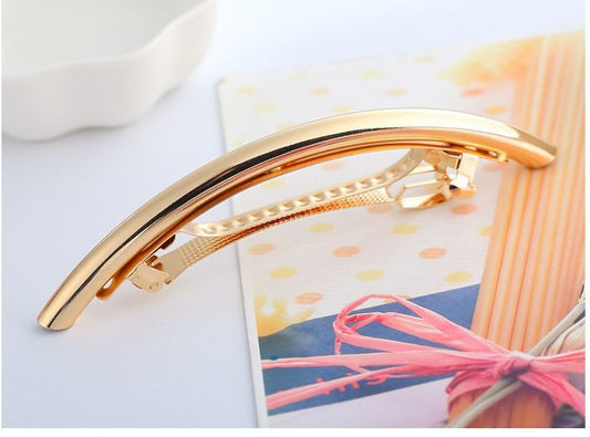 Metal tube crescent hair barrette