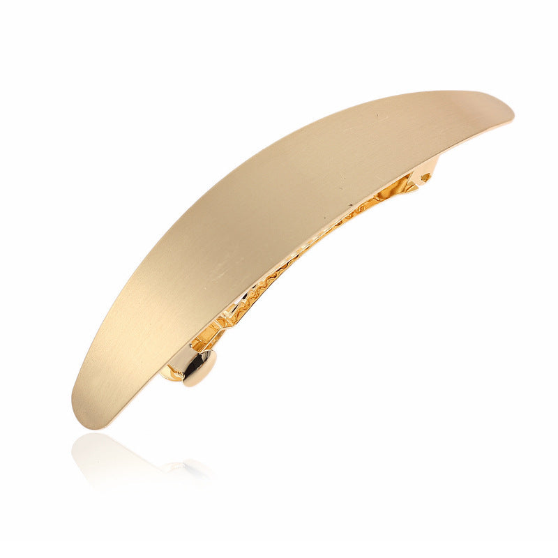 Oval barrette in matte metal