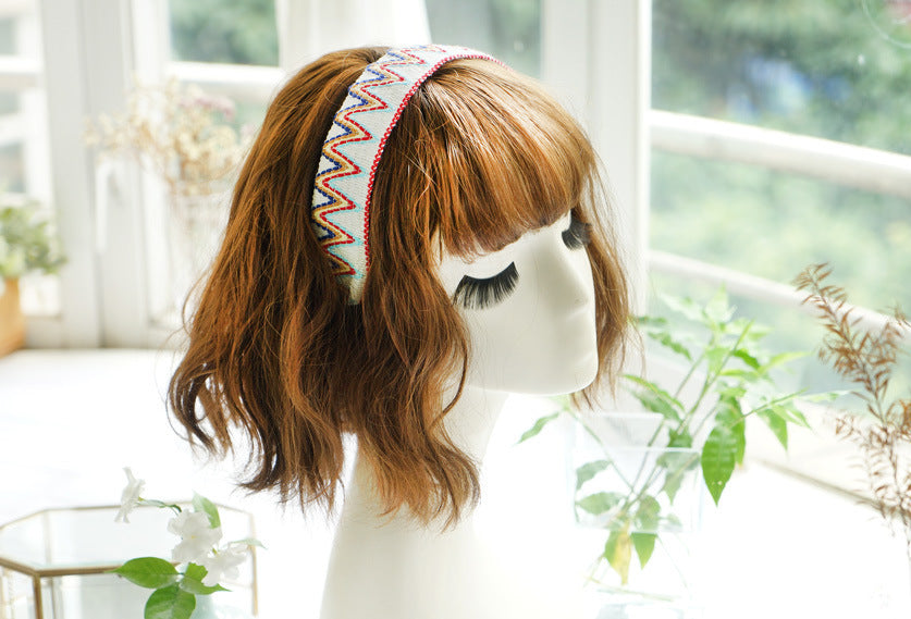 Knitted rainbow waves headband