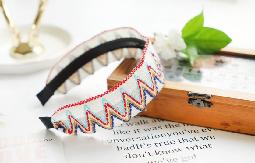 Knitted rainbow waves headband