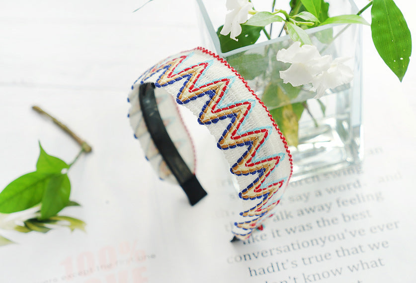 Knitted rainbow waves headband