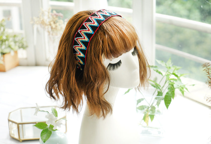 Knitted rainbow waves headband