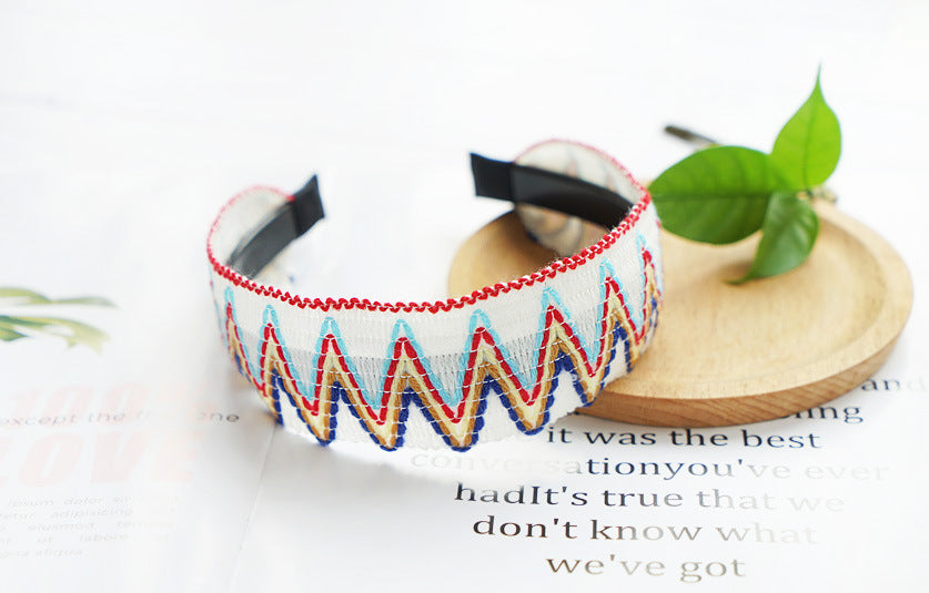 Knitted rainbow waves headband