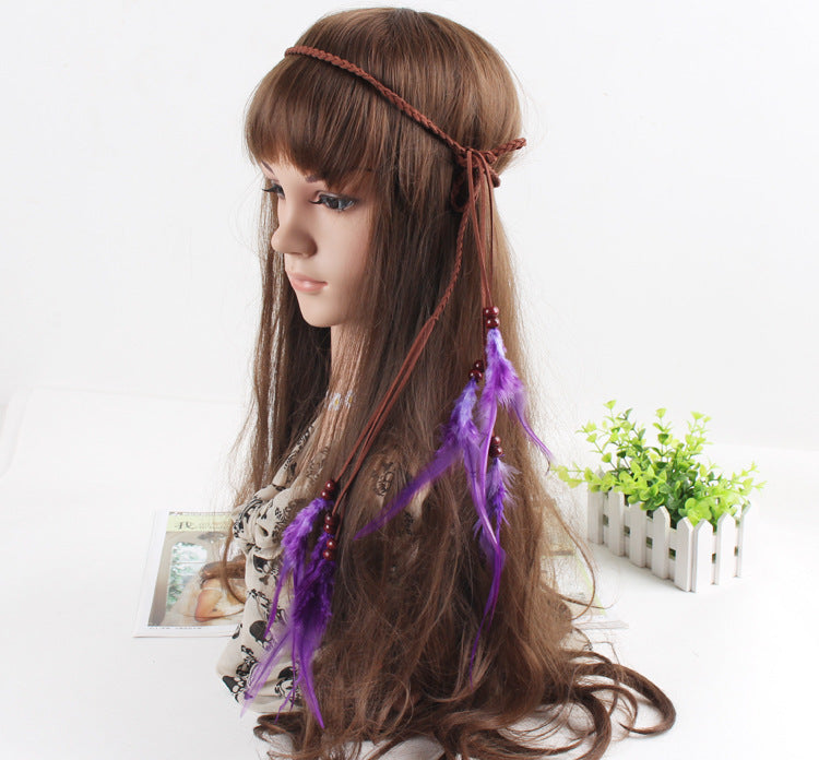 Braided brown suede band with purple feather hair tie