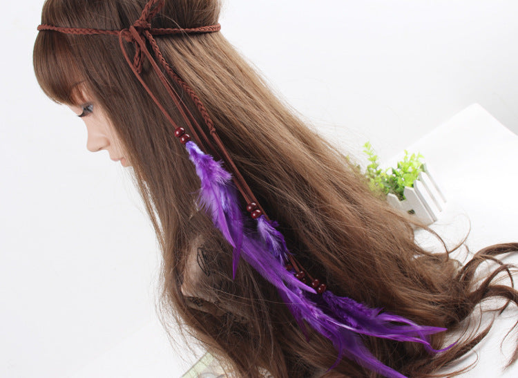 Braided brown suede band with purple feather hair tie